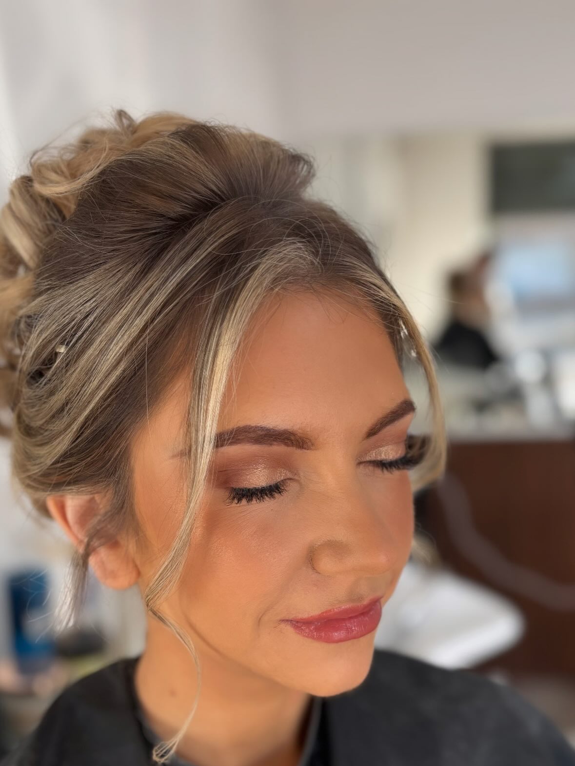 Bronze smokey eye and textured updo at The Dollz House